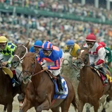 Horses racing at the Kentucky Derby