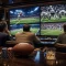 A bettor studies opening NFL Week 1 odds on a sportsbook screen before kickoff.